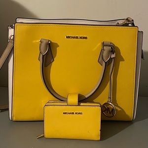 Michael Kors purse and small wallet. Gently used.
